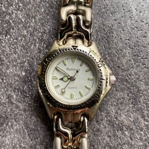 Rumors quartz wristwatch. Silver. Works but Needs battery. Japan movement